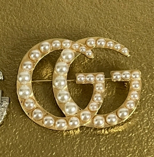 Monogram Broches